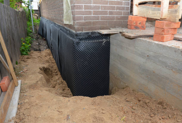 Happy homeowners after waterproofing job in Kendallville